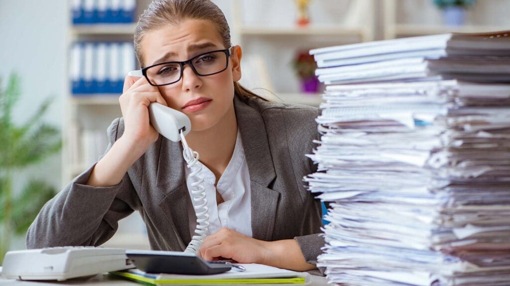Stressed Appraiser Buried Under Paperwork